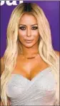  ?? Jason Kempin Getty Images ?? AUBREY O’DAY says she was made to remove her shirt in view of f liers.