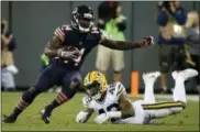  ?? MIKE ROEMER - THE ASSOCIATED PRESS ?? FILE - In this Sept. 28, 2017, file photo, Chicago Bears’ Deonte Thompson gets past Green Bay Packers’ Morgan Burnett during the first half of an NFL football game in Green Bay, Wis.