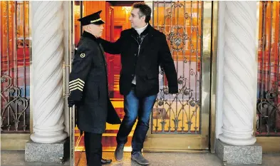  ?? RICHARD DREW / THE ASSOCIATED PRESS ?? Michael Cohen, former lawyer to President Donald Trump, leaves his apartment building on New York’s Park Avenue on Friday. In latest filings Friday, prosecutor­s are demanding prison time for Cohen.