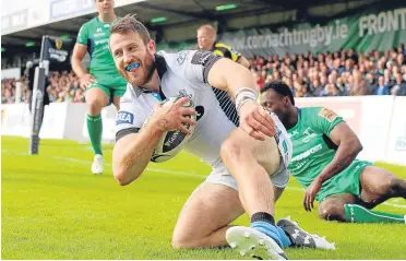  ??  ?? Glasgow’s Tommy Seymour celebrates scoring his side’s first try.