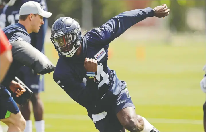  ?? — AP PHOTO ?? Seahawks rookie wide receiver D.K. Metcalf runs a drill during a rookie mini-camp on Friday. “I’m just going to be myself,” he says about all the attention he’s getting.