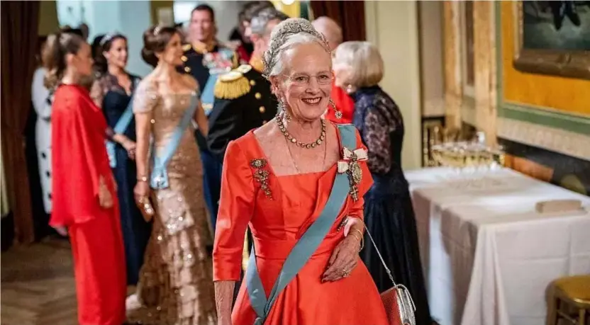  ?? ?? Queen Margrethe II of Denmark greets guests during a break at the Danish Royal Theatre to mark the 50th anniversar­y of her accession to the throne in Copenhagen, 10 Sept 2022
