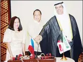  ??  ?? Foreign Affairs Undersecre­tary Ali Al-Saeed and Philippine Ambassador Renato Pedro Villa with his spouse
during the ceremonial cutting of the cake.