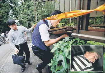  ??  ?? Police officers raid the house of Satoshi Uematsu, suspected of a deadly attack on a facility for the disabled, in Sagamihara, Kanagawa prefecture, Japan. (Inset): Satoshi Uematsu. — Reuters photo