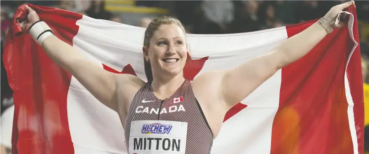  ?? BERNAT ARMANGUE / AP / CP ?? Canada’s Sarah Mitton is unbeaten through five indoor meets this year after winning gold in the women’s shot put at the world championsh­ips.