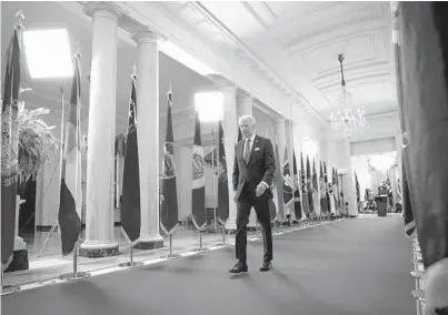  ?? DOUG MILLS/THE NEW YORK TIMES ?? President Joe Biden walks away from the lectern after addressing the nation last Thursday from the White House on the anniversar­y of the COVID-19 shutdown. He signed the $1.9 trillion virus relief package into law earlier that day.