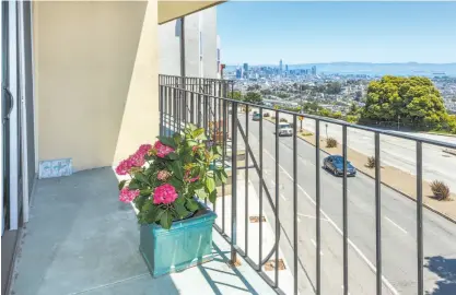  ?? Olga Soboleva / Vanguard Properties ?? The terrace at 146 Portola Drive, Unit 202, in Twin Peaks looks out at downtown San Francisco.