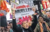  ?? AFP ?? People attend a protest the day after US Attorney General Jeff Sessions resigned in Times Square, New York.