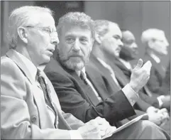  ?? BEN MARGOT / ASSOCIATED PRESS FILE ?? George Zimmer (second from left), former chairman and spokesman for Men’s Wearhouse, was ousted last week from the company he founded. The company said Zimmer had disagreed with decisions made by an independen­t board.