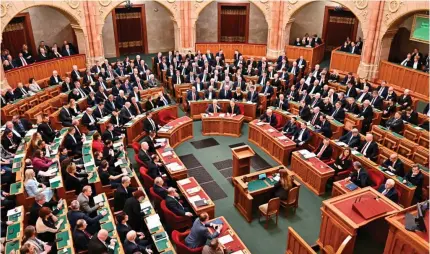  ?? AFP PHOTO ?? HURDLE CLEARED
Lawmakers vote on the ratificati­on of Sweden’s NATO membership in the main hall of Hungary’s parliament building in the capital Budapest on Monday, Feb. 26, 2024.