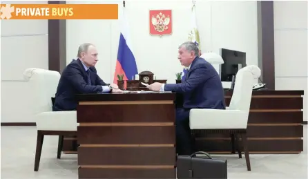  ?? — Reuters ?? Russian President Vladimir Putin meets with Rosneft’s CEO Igor Sechin at Novo-Ogaryovo state residence outside Moscow.