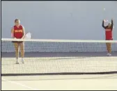  ?? ?? Highland’s No. 3 doubles team of Jaden Wilson (left) and Paris Harper (right) serve to their CAMS opponents during Friday’s playoff match at AVC.