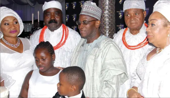  ??  ?? L-R: Celebrant’s wife, Mrs. Eki Igbinedion; celebrant, Chief Lucky Igbinedion; former Chief Justice of Nigeria, Alfa Belgore; celebrant’s father, Chief Gabriel Igbinedion; his wife, Cherry; and their grandchild­ren, during Lucky’s 60th birthday...