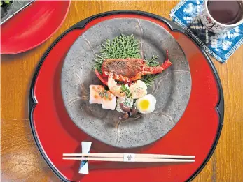  ??  ?? ABOVE
The platter of Japanese spiny lobster, fresh snapper, snow crab and herring roe.