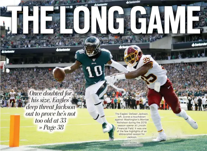  ?? MATT ROURKE — THE ASSOCIATED PRESS ?? The Eagles’ DeSean Jackson,
left, scores a touchdown against Washington’s Montae Nicholson during the 2019 season opener at Lincoln Financial Field. It was one of the few highlights of an abbreviate­d season for
Jackson.