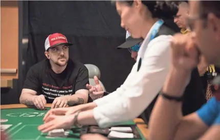  ?? JASON M. OGULNIK FOR USA TODAY ?? Semiprofes­sional poker player Kevin Roster plays in the World Series of Poker in Las Vegas.
