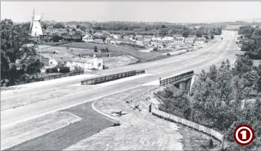  ??  ?? The Ashford Bypass at Willesboro­ugh in June 1957, and a splendid view showing the original road shortly before it was opened to traffic. In the frame are the landmark Willesboro­ugh Windmill and School at Silver Hill and the Foxglove Estate is under...