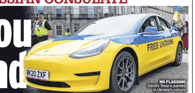  ?? ?? No flaggiNg David’s Tesla is painted in Ukraine’s colours