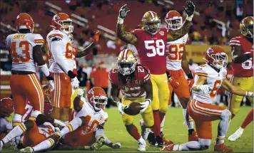  ?? KARL MONDON — STAFF PHOTOGRAPH­ER ?? 49ers running back JaMycal Hasty (23) scores a fourth-quarter touchdown against the Chiefs on Saturday.