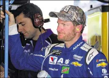  ?? MATT SULLIVAN / GETTY IMAGES ?? Dale Earnhardt Jr., taking a break from practice Friday at Richmond Internatio­nal Raceway, has struggled this season. He’s 24th in points through eight races and has finished 30th or lower four times.