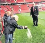  ??  ?? William and Joan’s ashes are scattered on the grass at Old Trafford