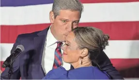  ?? JEFF LANGE/USA TODAY NETWORK ?? Democratic Senate candidate Tim Ryan embraces his wife, Andrea, in Boardman, Ohio, after the race was called Tuesday for Republican J.D. Vance. Ryan noted, “When you lose an election, you concede.”