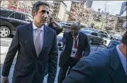  ?? JEENAH MOON / THE NEW YORK TIMES ?? The president’s ex-lawyer Michael Cohen, seen in April at a court in New York, may be charged with bank fraud and more financial crimes, sources say.