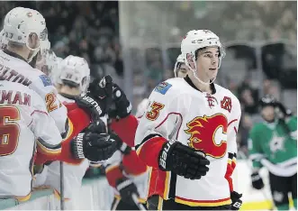  ?? RONALD MARTINEZ/GETTY IMAGES FILES ?? Despite a slow start, Sean Monahan is leading the Calgary Flames in goals with 10 in his first 34 games, and contribute­d an assist to Monday night’s win over the Arizona Coyotes.