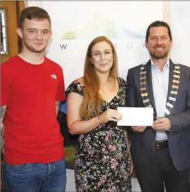  ??  ?? Ryan Lynham, Rosanna Doherty and Art Oakes accept a cheque from Cllr Steven Matthews on behalf of the National Learning Network.