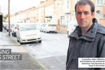  ??  ?? Councillor Adam Williams and residents say antisocial behaviour has become an issue in the street