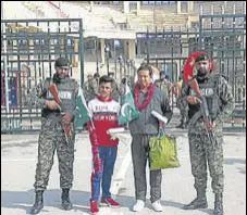  ?? ANI ?? Mubarak, alias Mubarshar Bilal (2nd from left), and Sajjad Haider with Pakistani Rangers on Tuesday.