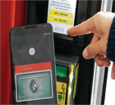  ?? Jeff Chieu / Associated Press ?? A key reason consumers are hesitant to adopt mobile payments like Apple Pay and Android Pay, surveys say, is fear over security.