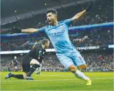  ?? (Reuters) ?? ARGENTINA STRIKER Sergio Aguero celebrates doubling Manchester City’s lead en route to a 2-1 home victory over Burnley yesterday. Aguero now has 11 league goals this season.