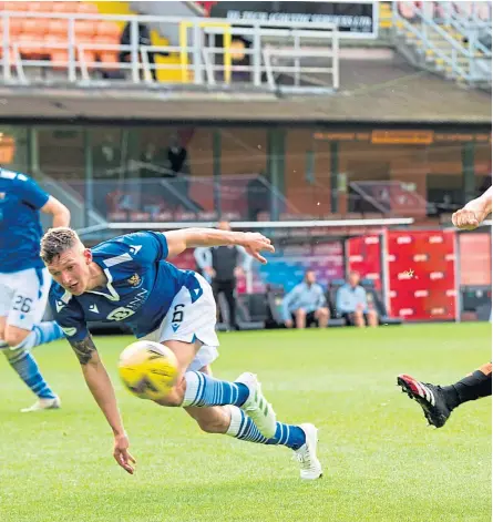  ?? Picture: SNS. ?? Lawrence Shankland fires over after twisting past Saints defender Liam Gordon.