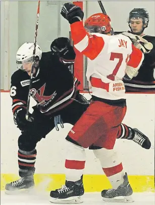  ?? JASON SIMMONDS/JOURNAL PIONEER ?? Isaac Jay, white jersey, of the Arsenault’s Fish Mart Western Red Wings and the Kensington Moase Plumbing and Heating Vipers’ Tyler Burton collide during first-period action of Friday night’s Game 4 in the best-of-seven Island Junior Hockey League championsh­ip series at the Evangeline Recreation Centre.