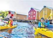  ?? ?? Paddle power: Norway is one of Alesha’s favourite destinatio­ns