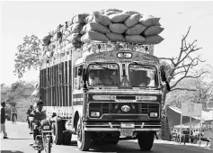  ??  ?? Truckers are neutralisi­ng this fall in dispatches through higher loading of agricultur­al produce, with early harvesting in this rabi season. Agricultur­al goods are exempt from GST and do not require generation of e-way bills