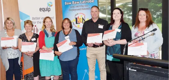  ??  ?? Receiving recognitio­n for their support of Warragul District Specialist School in the Inspiring Young People program are, from left Erika Williams, Janet Parker, Stacey Rosentrete­r, Donna Hallam, Warwick Baum, Brooke Baker and Emma Winchcombe.