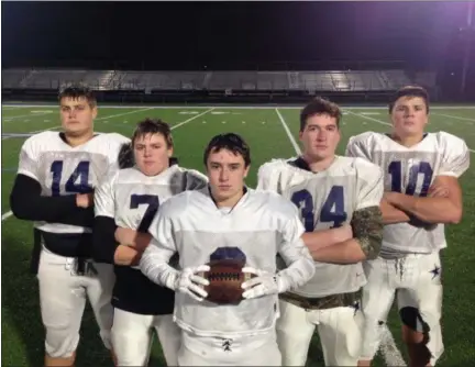  ?? JOHN KAMPF — THE NEWS-HERALD ?? Members of the Kenston starting offensive line are, from left, Alex Robarge, Justin Schroeder, Brandon Schroeder, Jeremiah Jones and George Sell. The line has allowed only two sacks through 13 games for Kenston, which plays Columbus Eastmoor on Nov. 23 in a Division III state semifinal.