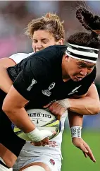  ?? Picture: Phil Walter/Getty ?? England’s Sarah Hunter tackles New Zealand’s Charmaine McMenamin