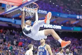  ?? (AFP) ?? Paolo Banchero of Orlando Magic dunks during the fourth quarter against Philadelph­ia 76ers in their NBA match at Wells Fargo Center on Monday