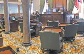  ?? STAFF PHOTO BY ANDY SHER ?? Senators’ desks at the Tennessee state Capitol in Nashville have been rearranged to provide wider social distancing between members.