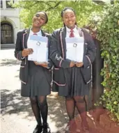  ?? Picture: SIMTEMBILE MGIDI ?? LEGAL EAGLES: Girls’ High School pupils Nande Dube, left, and Jabu Seti made not only their school proud, but the whole of the Eastern Cape when they were chosen as the best team at the National Schools Moot Court Competitio­n in Pretoria