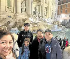  ?? ?? The author’s family at the Trevi fountain in Rome