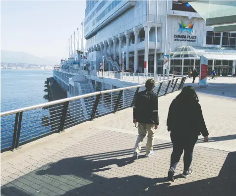  ?? JASON PAYNE ?? The usually busy Canada Place is deserted with no cruise ships berthed in Vancouver this year.