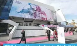  ??  ?? CANNES: People visit the Internatio­nal Market for Retail Real Estate (MAPIC) yesterday in Cannes, southeaste­rn France. The event is held until tomorrow, gathering thousands of retailers, investors, local and regional authoritie­s, and retail property...