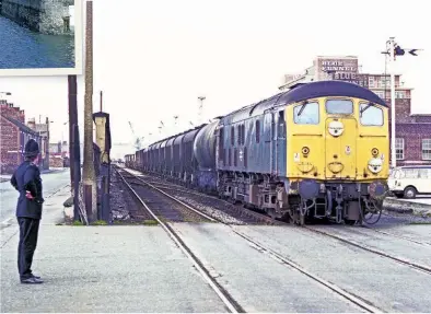  ?? RAIL PHOTOPRINT­S ?? Right: Birkenhead docks, on the Mersey’s south bank, may not have had the tunnels that Liverpool’s dockland railway boasted, but its 4½ miles of railway from Rock Ferry to Bidston was packed with modelling potential. Some of the tracks ran through cobbled streets and there was a branch line across West Float that used the rolling bascule bridge on Duke Street. Whether it was ‘9Fs’ hauling ore to Bidston, big blue diesels bringing in grain or coal or ‘03’ or ‘08’ shunters pottering about, a Birkenhead docks layout would certainly stand out from the crowd.