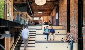  ??  ?? COMFORT ZONE Slack's Hamilton Street office features exposed bricks and beams, plus a wall clad in dried moss