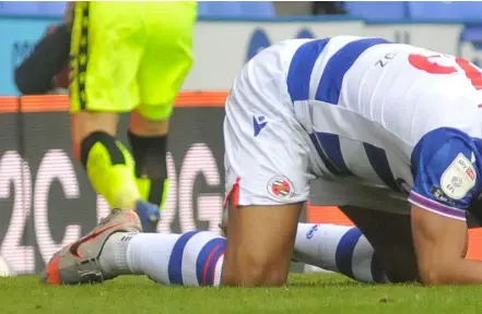  ?? Picture: Steve Smyth ?? Reading captain Liam Moore sinks to his knees after the Royals concede