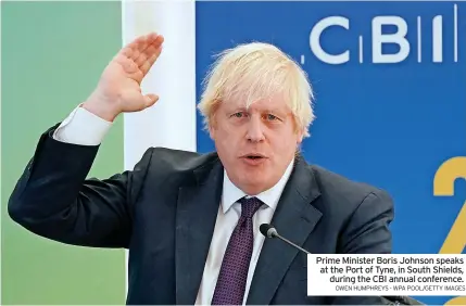  ?? OWEN HUMPHREYS - WPA POOL/GETTY IMAGES ?? Prime Minister Boris Johnson speaks at the Port of Tyne, in South Shields, during the CBI annual conference.